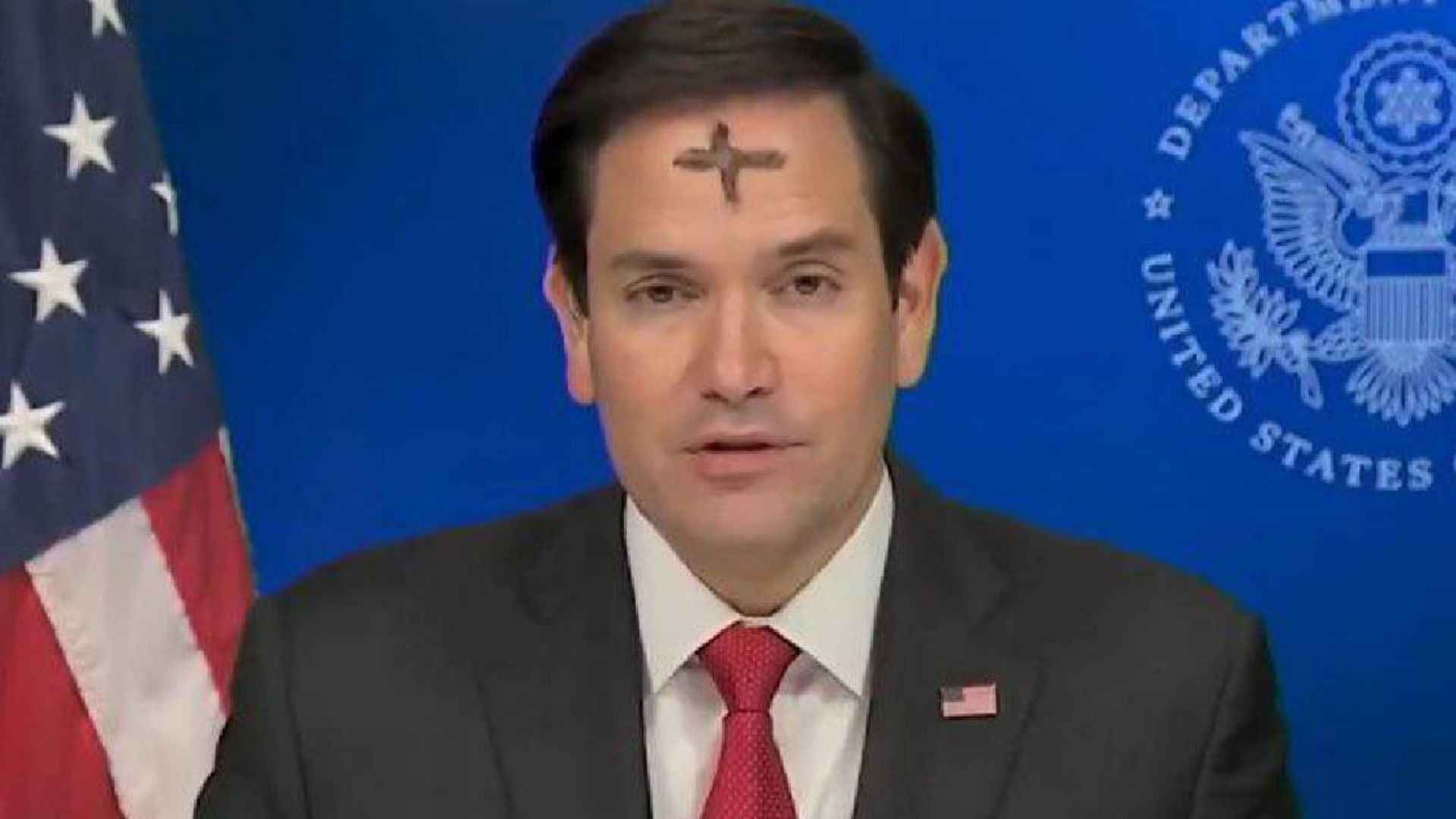 Rubio Cross on Forehead
